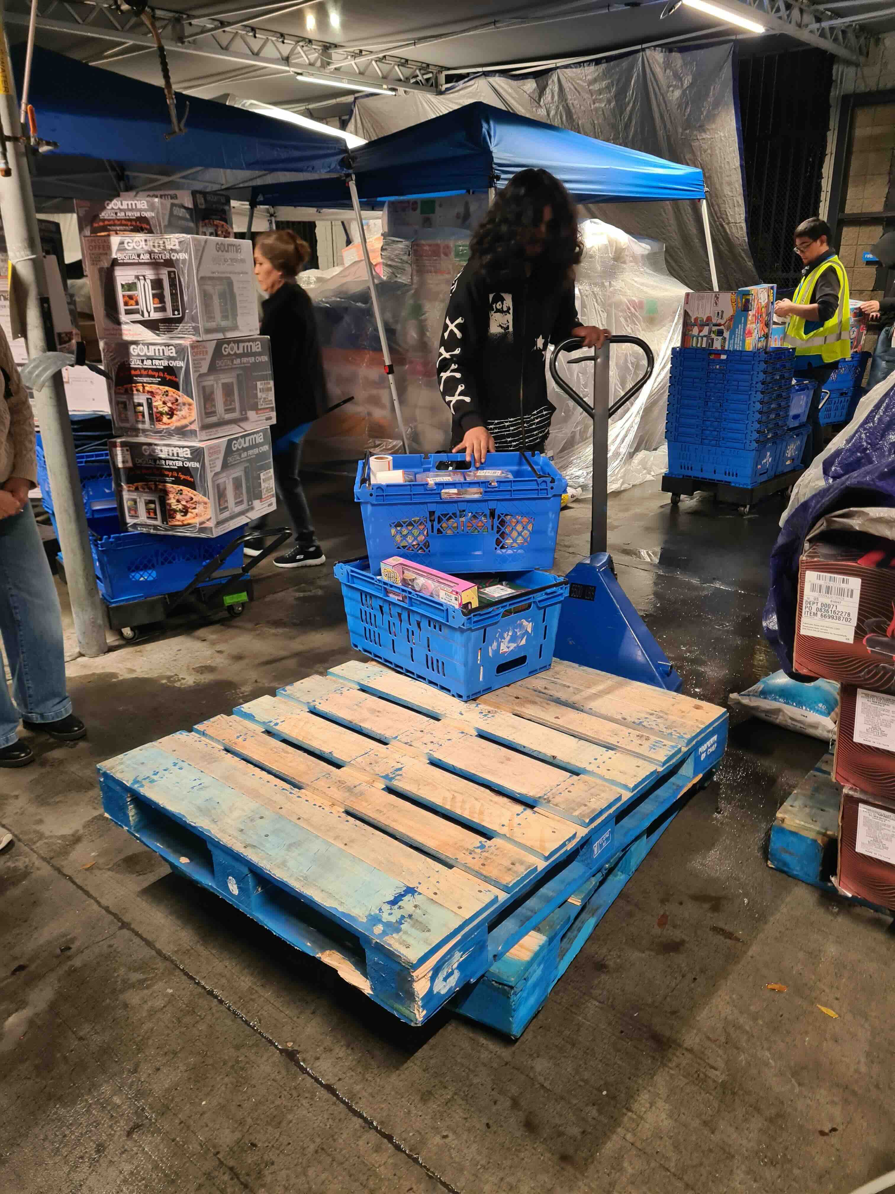 Picked Walmart items moved toward the containerization area