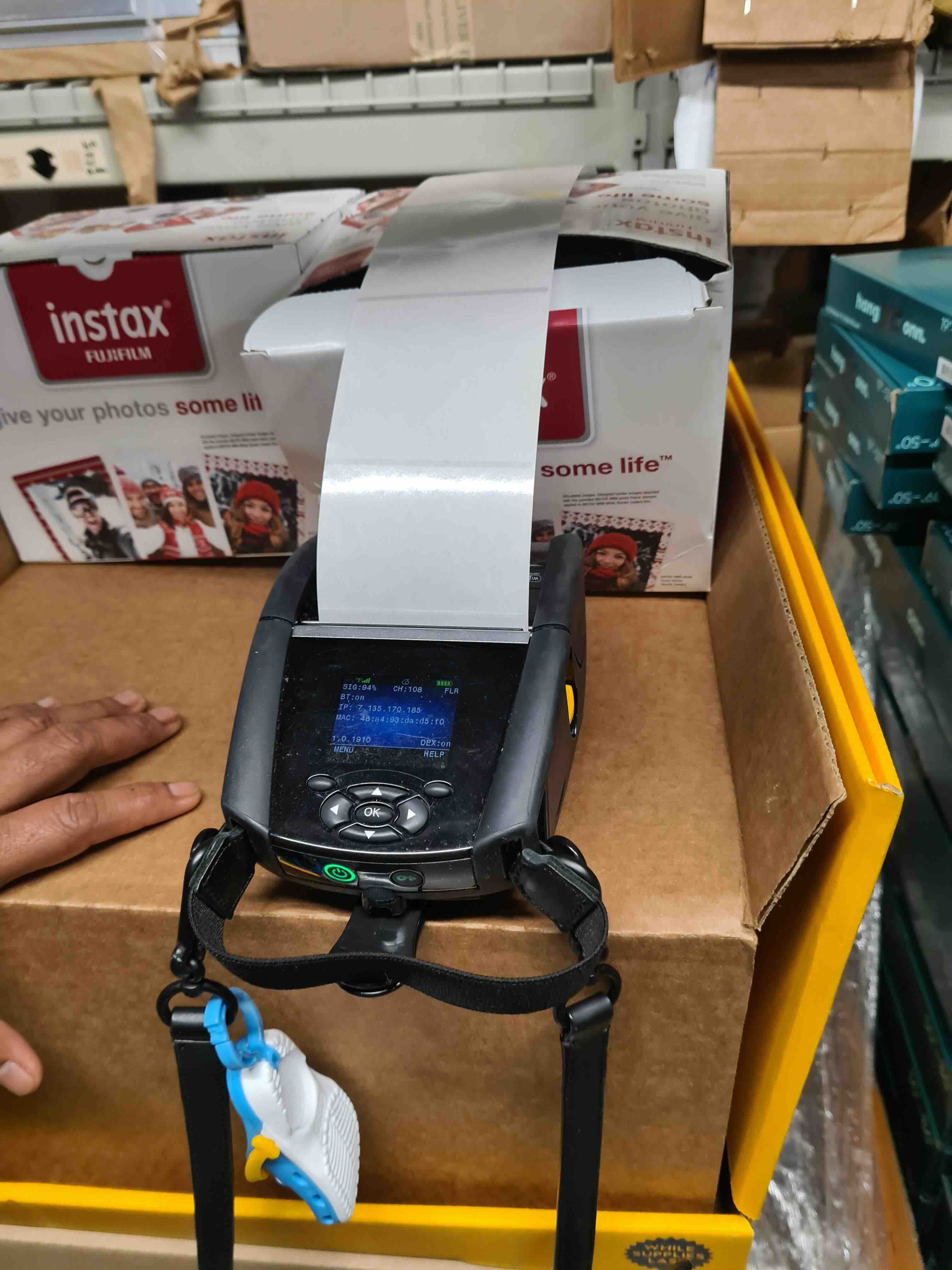 Walmart label printer generating stickers for packed items
