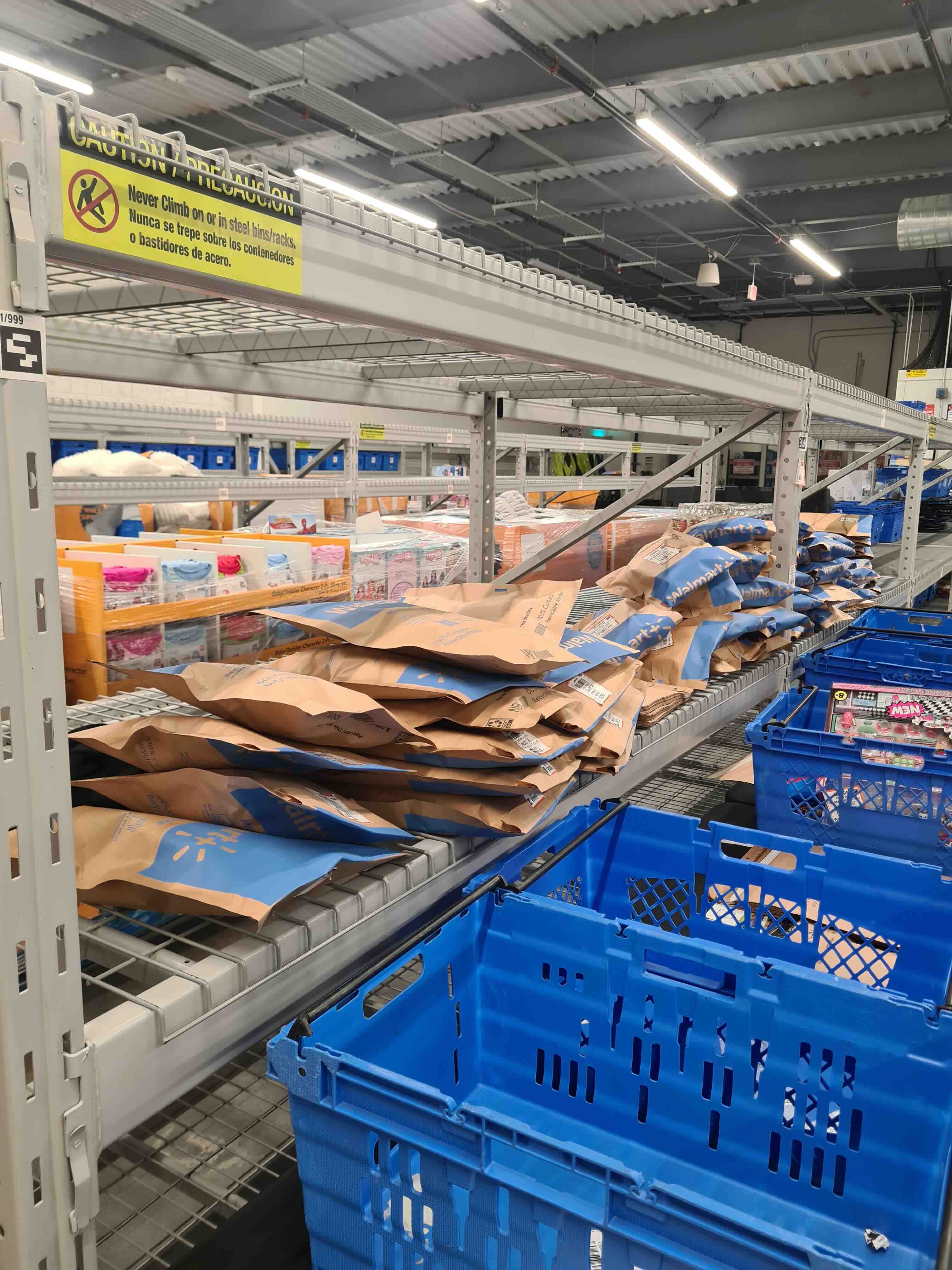 Trip labels attached to containers for Walmart order staging